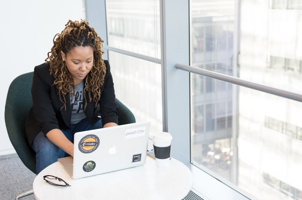 African American Woman Typing on a Laptop